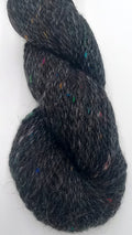 Stella Confetti – True Black Suri Alpaca Worsted Yarn with Rainbow Silk – Fehrenbach Fibers